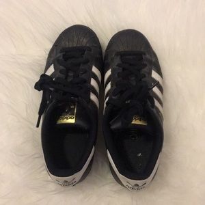 Black Adidas Superstars